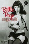 Cover for Bettie Page: Unbound (Dynamite Entertainment, 2019 series) #1 [Black Bag Photo Cover]